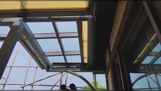 Auvent de toit rétractable pour véranda